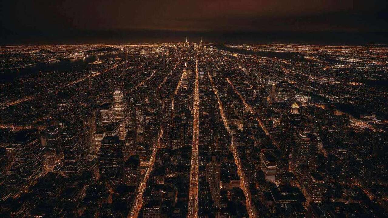 New York City skyline at night showcasing modern commercial buildings and engineering infrastructure